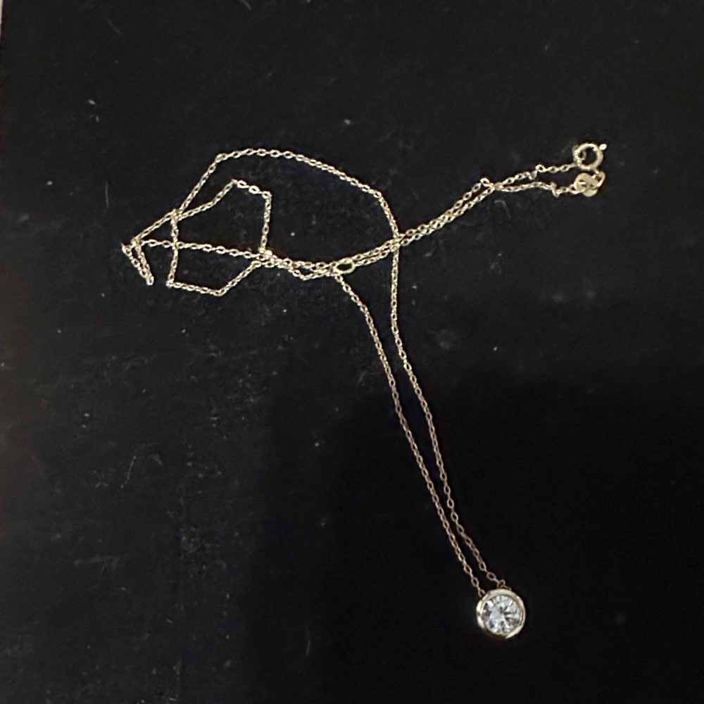 Elegant Gold Necklace with Crystal Pendant